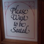 please wait to be seated